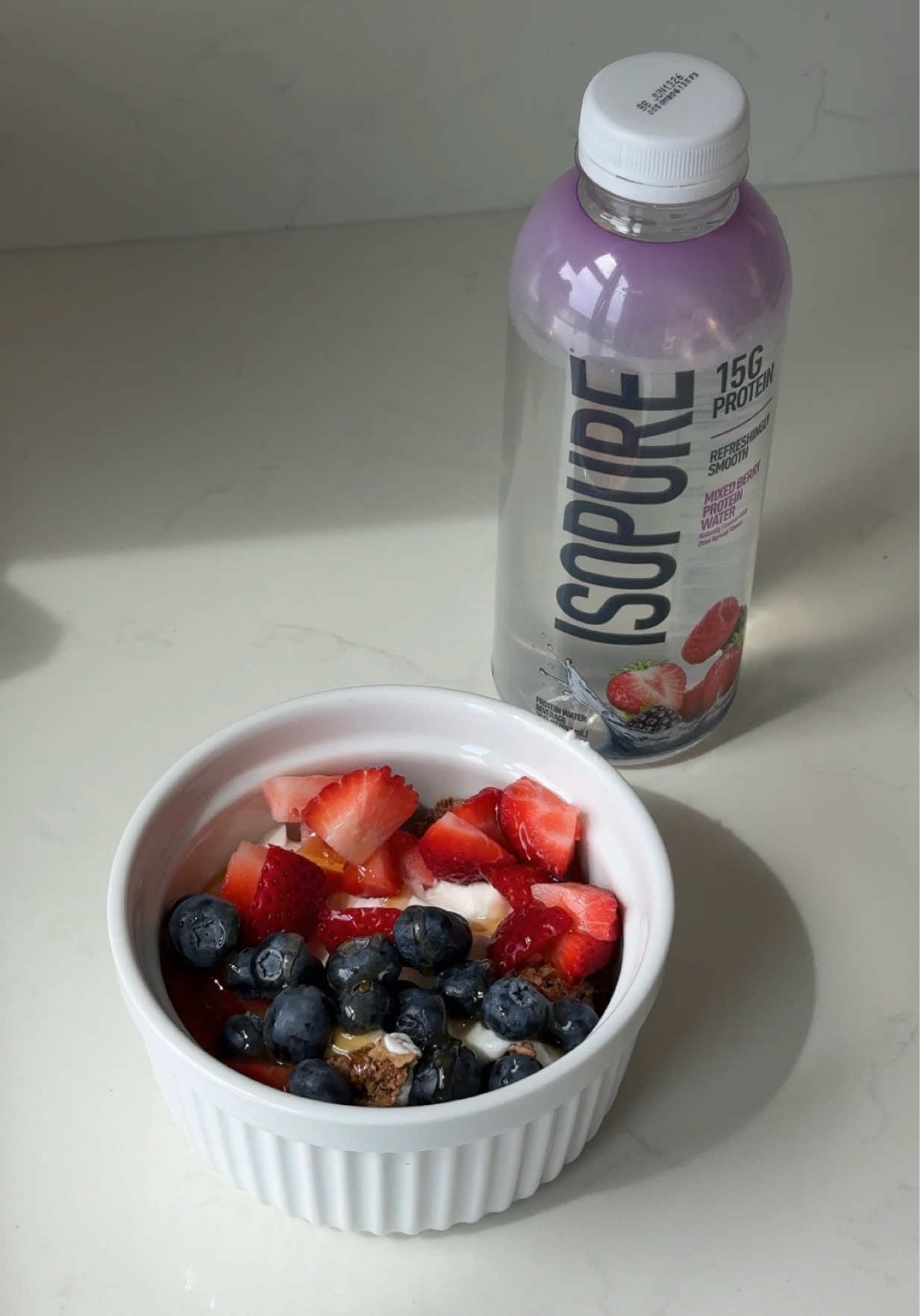 TikTok post by @brookelmason for Isopure. Caption reads: #IsopurePartner time stamped morning in my life....