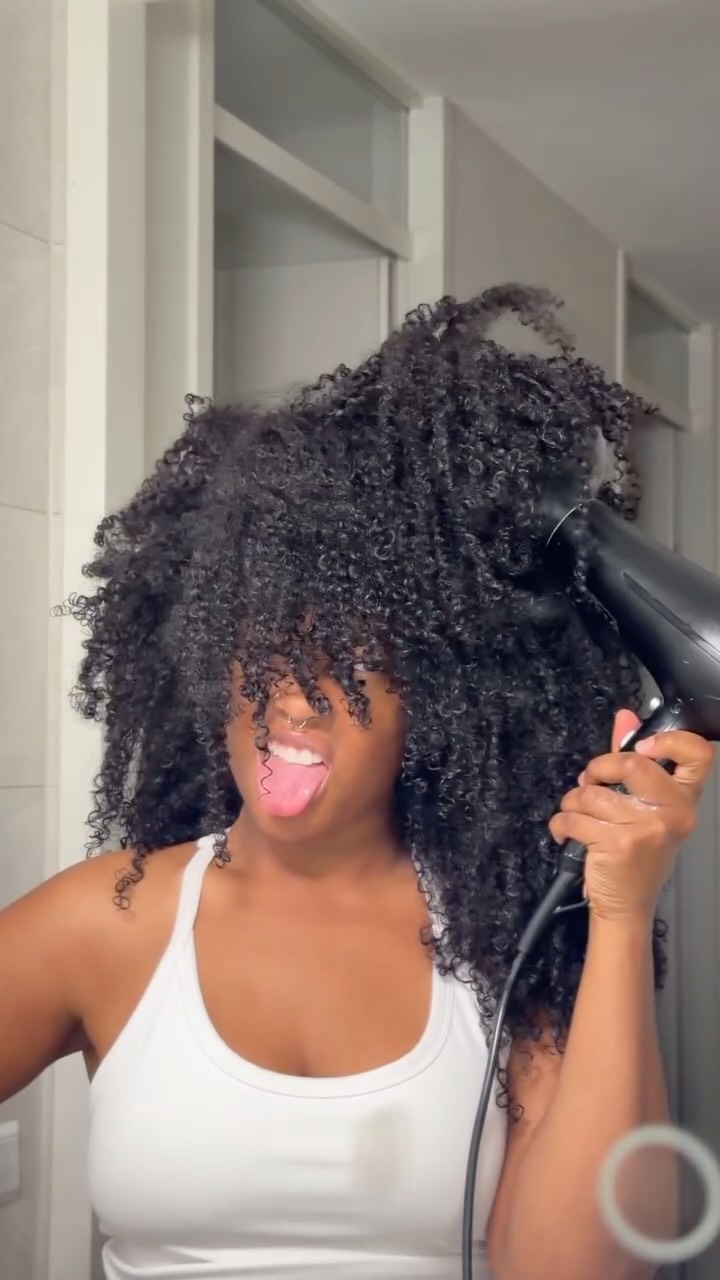 Instagram post by @ramonecharissa for UMBERTO GIANNINI. Caption reads: wash day 😩 aka doomsday! @umbertogiannini thank....