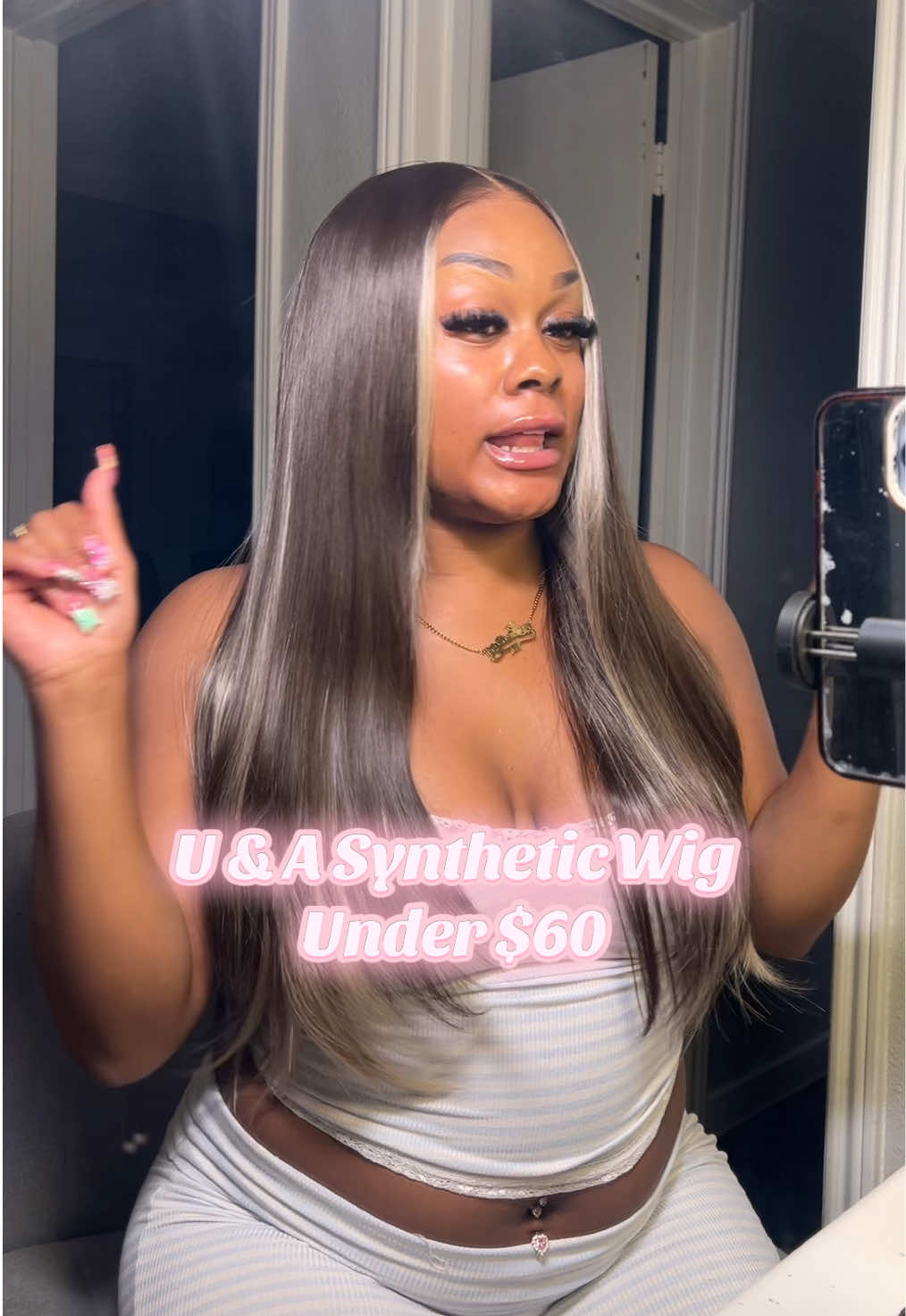 TikTok post by @iamshelbylu for UA Hair. Caption reads: [...] Silky & Comes In Different Colors😍🔥 @UA....