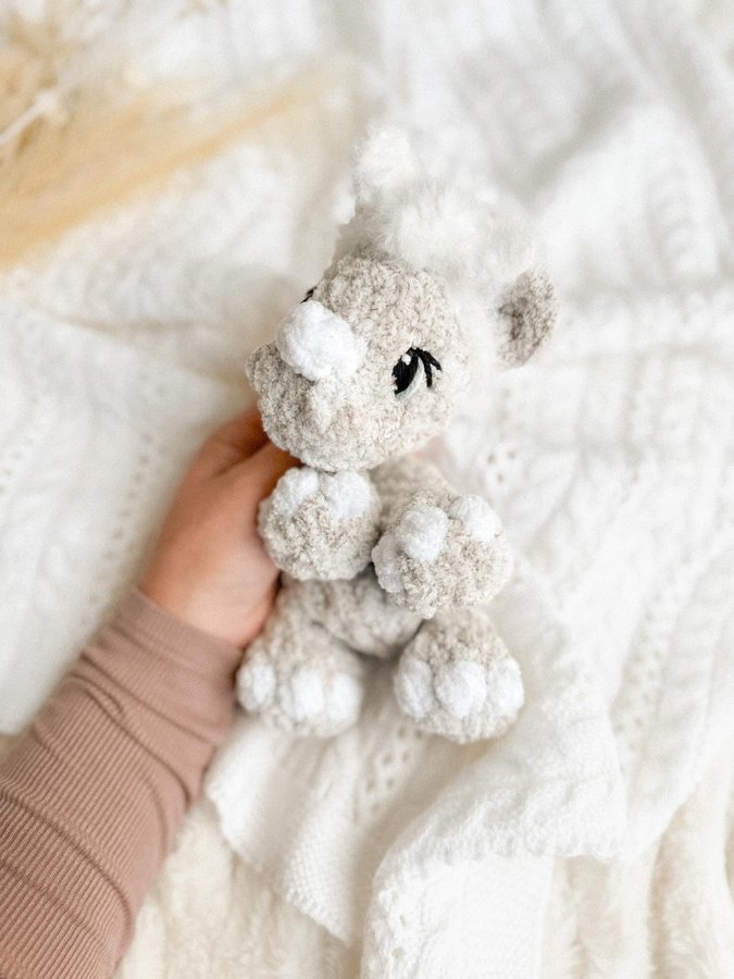 Instagram post by @loopstoloveys for Yarnspirations. Caption reads: [...] #amigurumi #bernatblanketyarn....