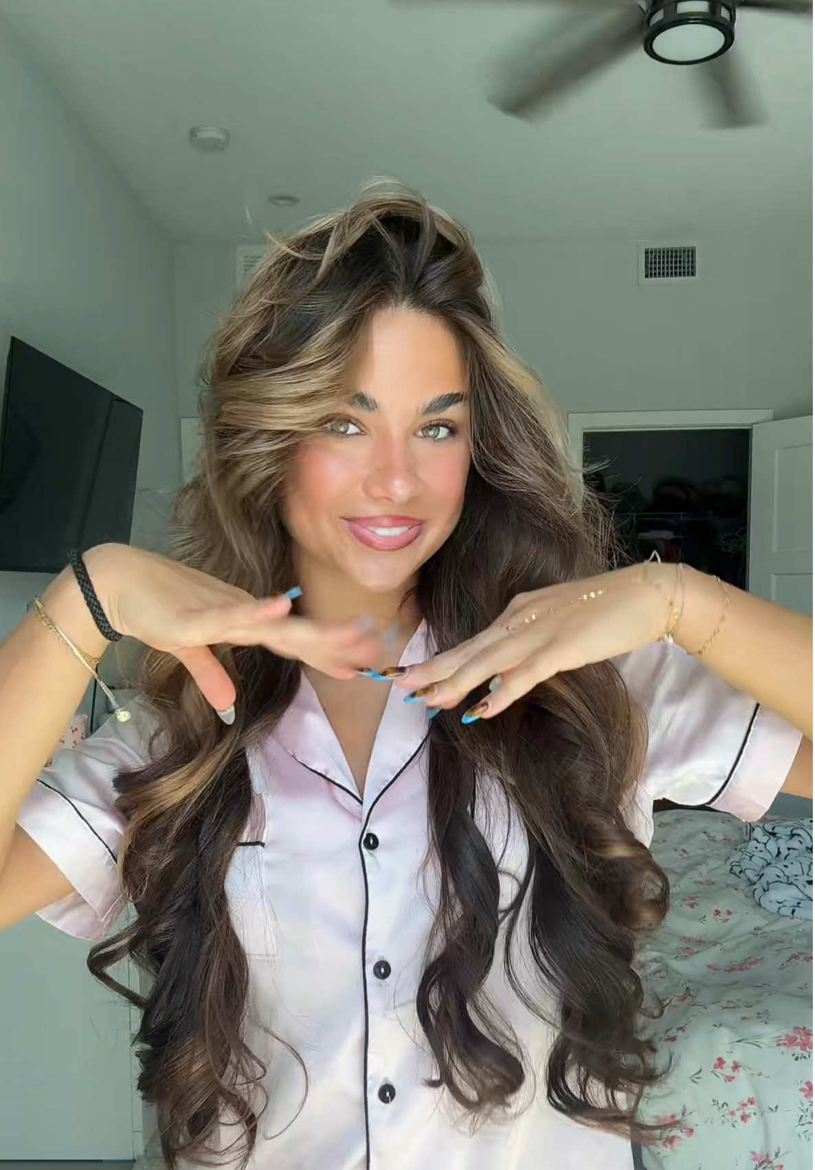 TikTok post by @itzalisachka for TYMO Beauty. Caption reads: [...] how easy it is to get these curls!! @TYMO....