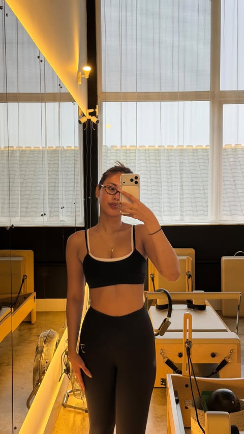 Instagram post by @nicchalantorn for Astoria Activewear. Caption reads: what I wear to the gym today ft.....