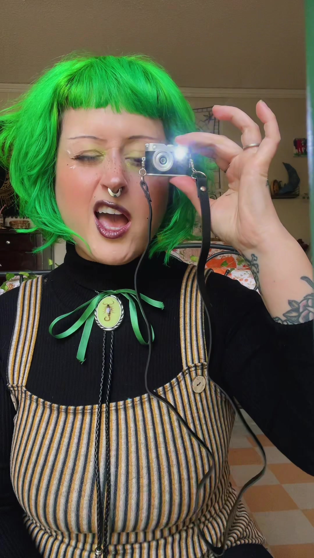 TikTok post by @_cosmic_cannoli_ for Fitpolo. Caption reads: This tiny little camera is perfection and made for....