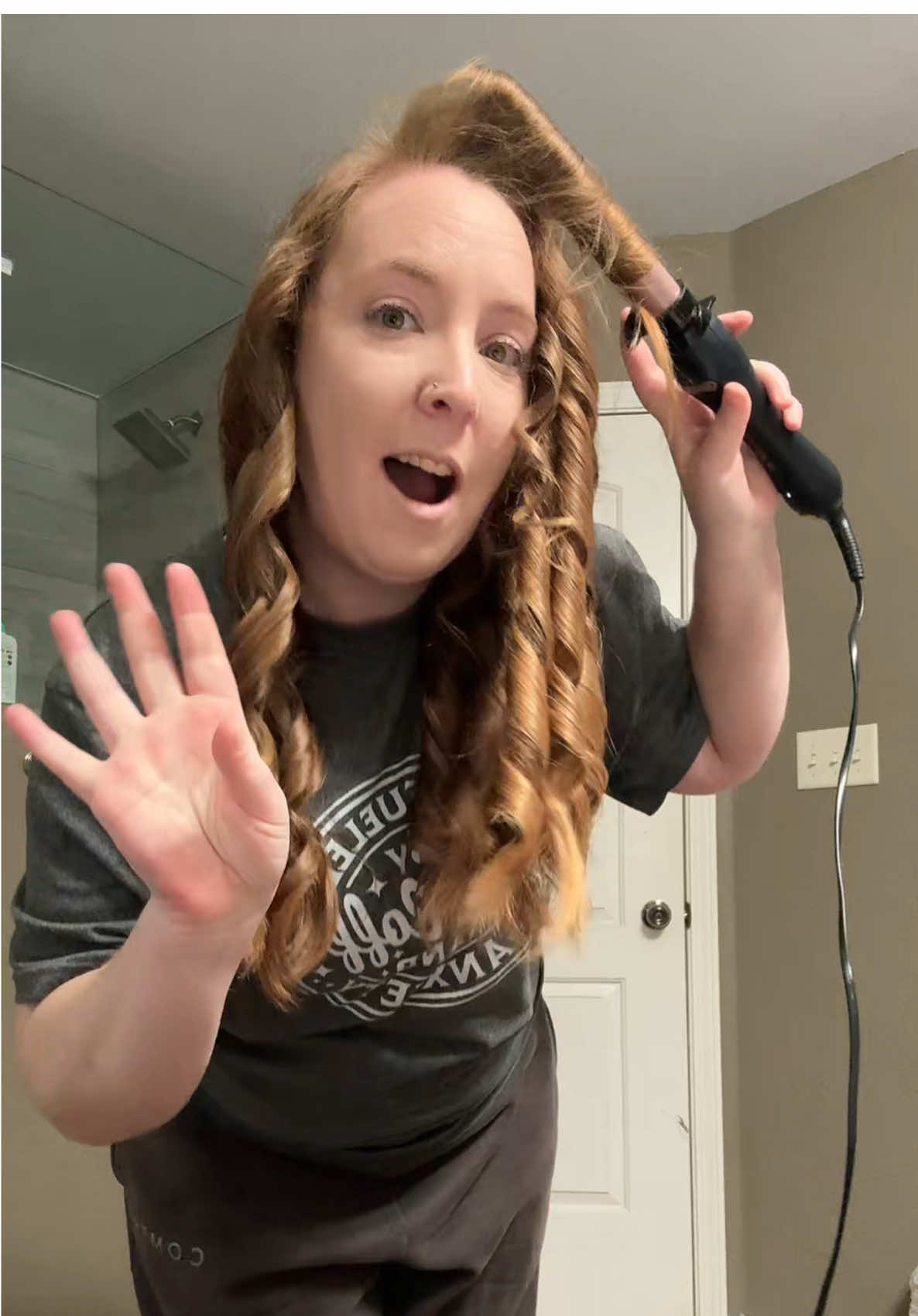 TikTok post by @notyourperfectmom for Beachwaver. Caption reads: [...] 😅 Clamp, press a button, and the Beachwaver....