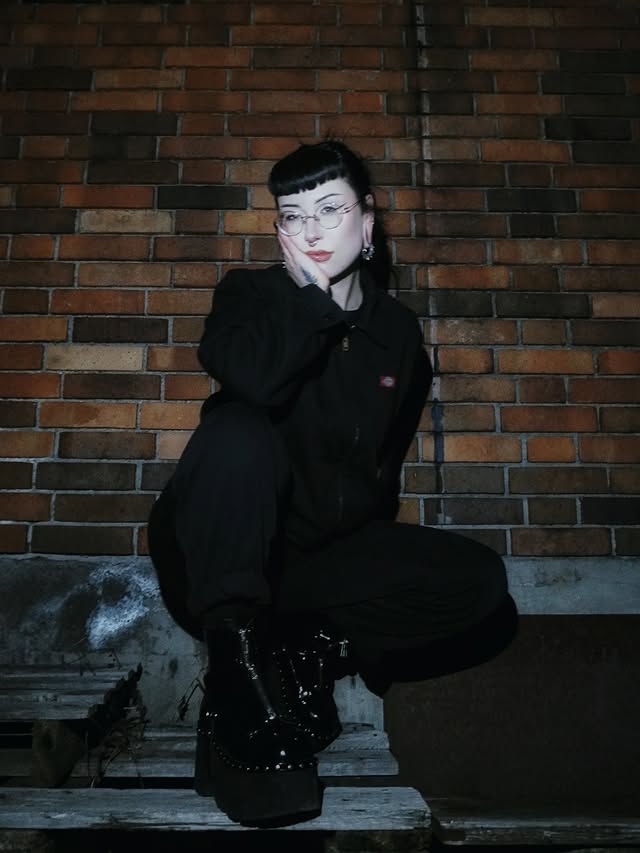 Instagram post by @svartura for Demonia Shoes. Caption reads: Feeling cute in these pics + this track by....
