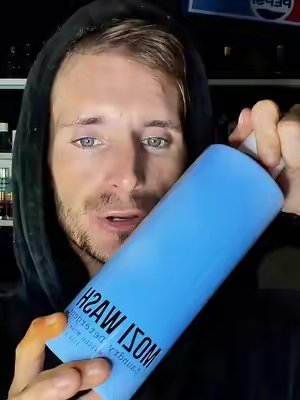 TikTok post by @justin.stewart_hq for Mozi Wash. Caption reads: @Mozi Wash this Malibu Mornings is EVERYTHING! Get....