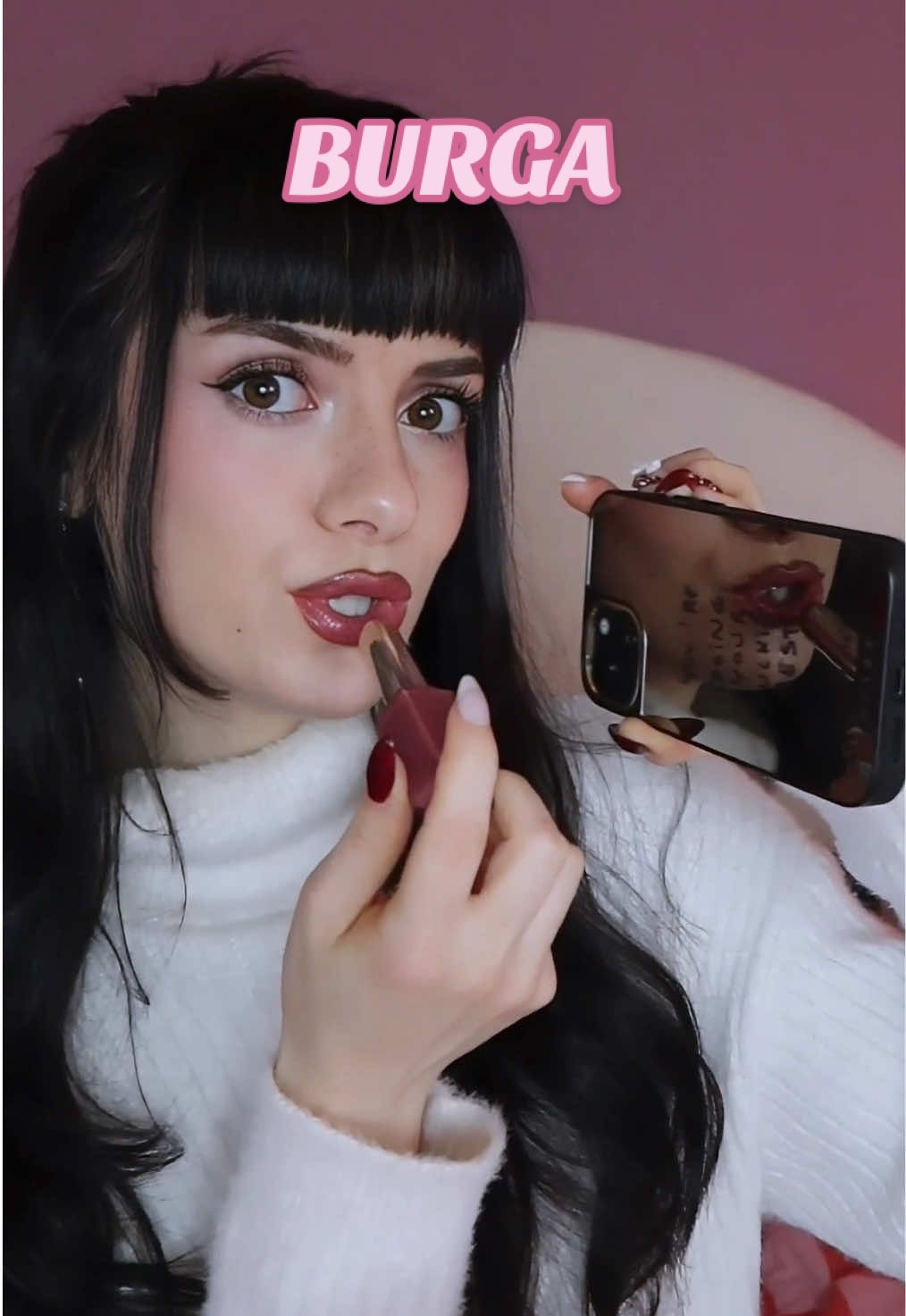 TikTok post by @sleepymarieasmr for BURGA. Caption reads: Grâce à @BURGA, je vais slay en 2026 !! ✨💕 [...].