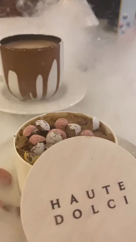 Instagram post by @ash_ikaap for HAUTE DOLCI. Caption reads: [...] tried the new crunch cake yet from....