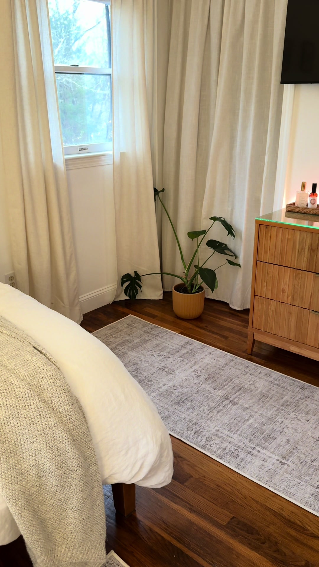 TikTok post by @christinamh10 for Tumble Circus. Caption reads: the most perfect rugs from @Tumble and now my room....