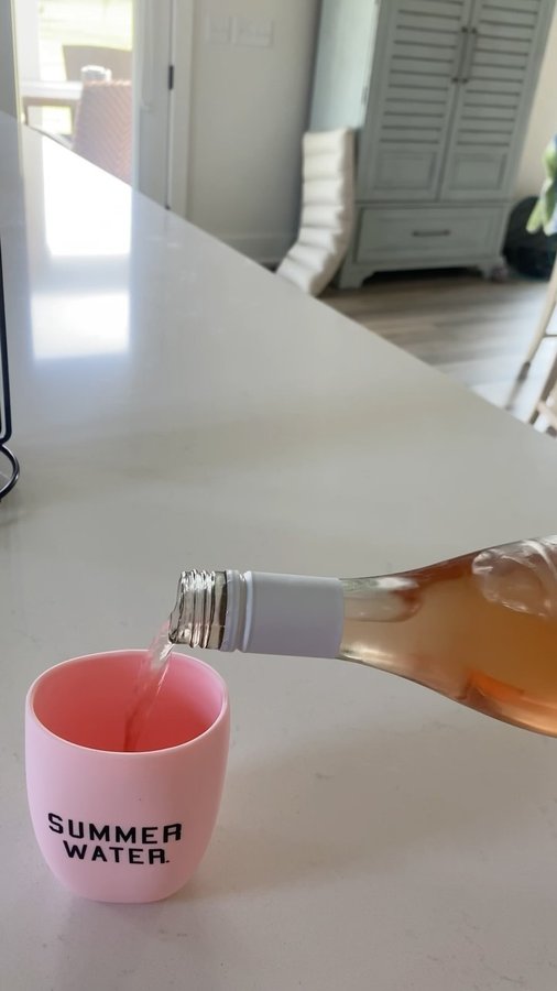 Instagram post by @laura.slater_ for Summer Water. Caption reads: Zero calorie wine?? Yes please! Have rose all day....