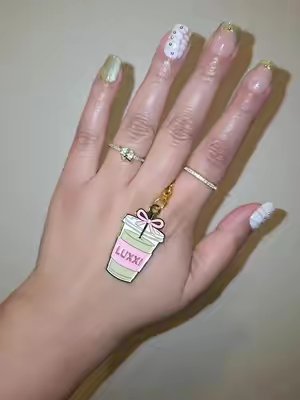 TikTok post by @april_corona for Luxxi Nails. Caption reads: [...] #MatchaMilk #StrawberryMatcha @LUXXI NAILS.