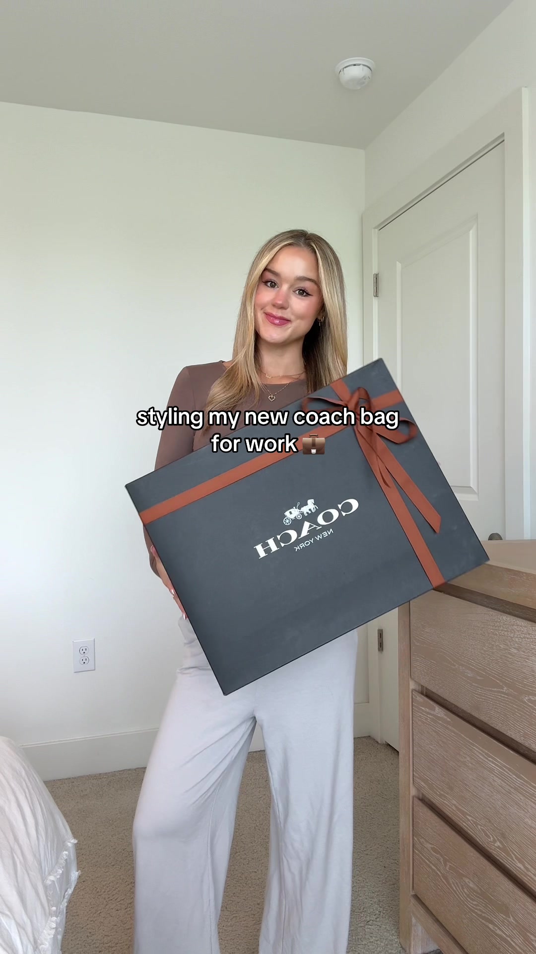 TikTok post by @whitneygrett for LTK. Caption reads: will be wearing this all summer @Coach #workwear....
