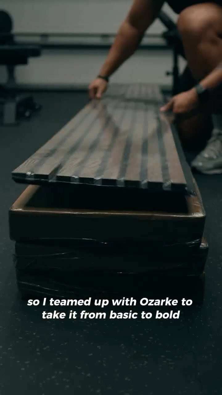 Instagram post by @officialjuanmena for Ozarke. Caption reads: [...] why I upgraded my garage gym with @ozarke....