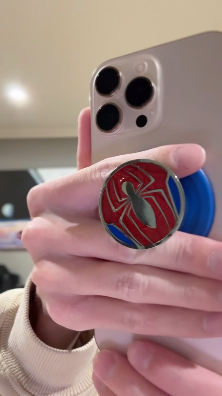 Instagram post by @hitomidocameraroll for PopSockets. Caption reads: I know you didn’t get everyone a gift yet, I can....