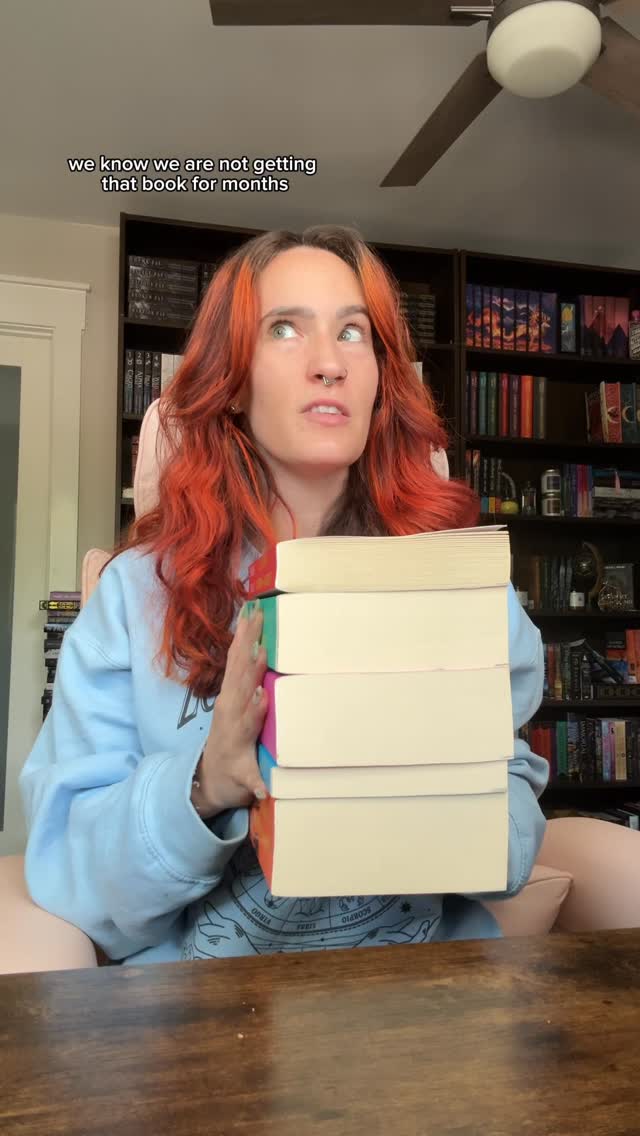 Instagram post by @thtgrlreads for The Sims. Caption reads: Create your own Romantasy book ending and win a....