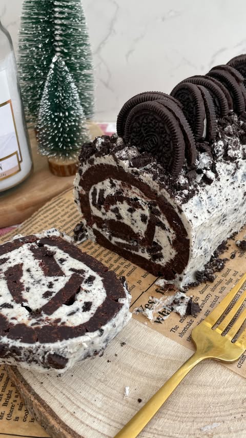 Instagram post by @sophsgoodies for Black Milk. Caption reads: This Oreo Brownie Yule Log is honestly the best....