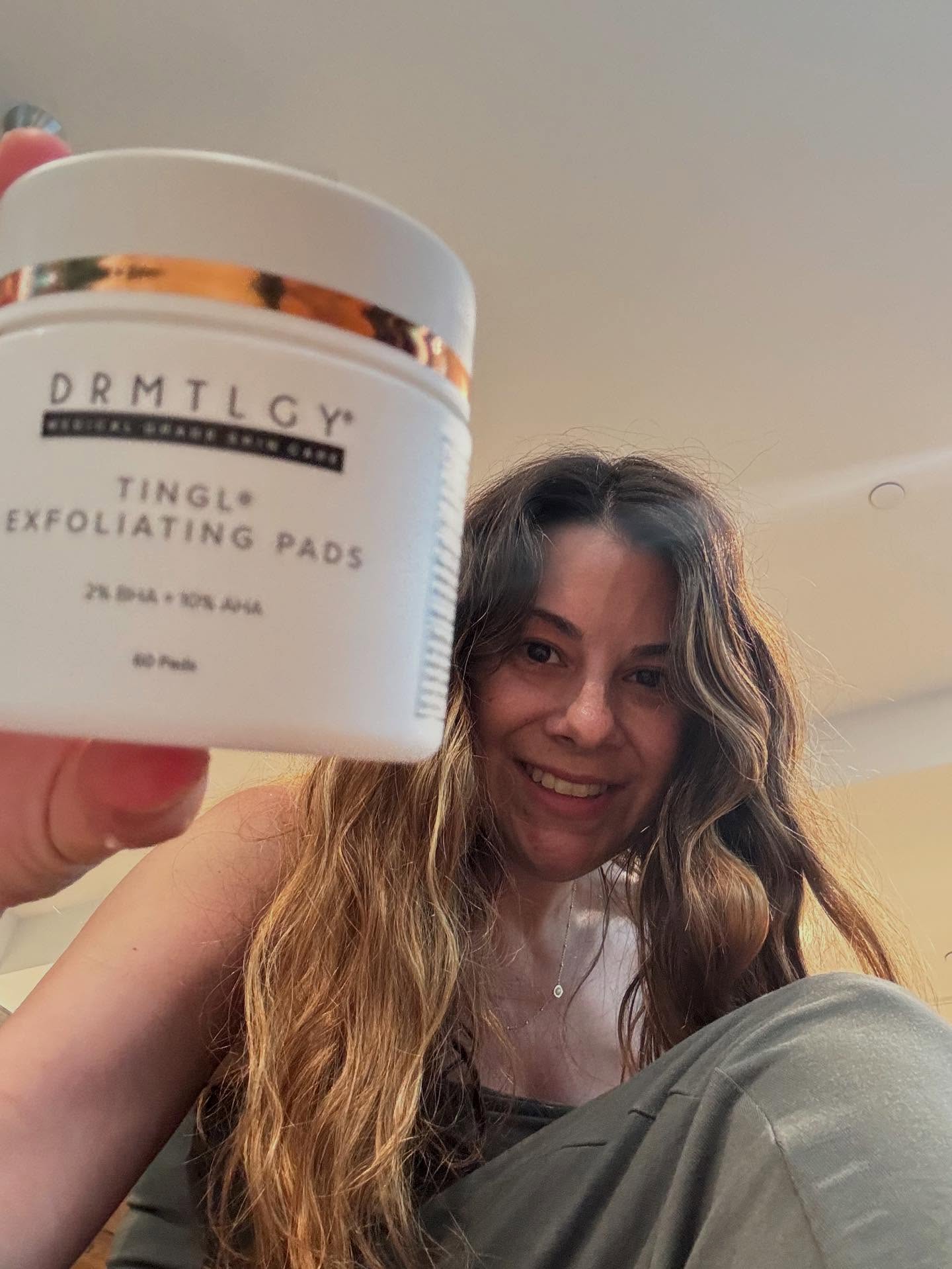 Instagram post by @heathersrecommendations_ for DRMTLGY. Caption reads: Using the @drmlgy Tingly Exfoliating Pads twice....