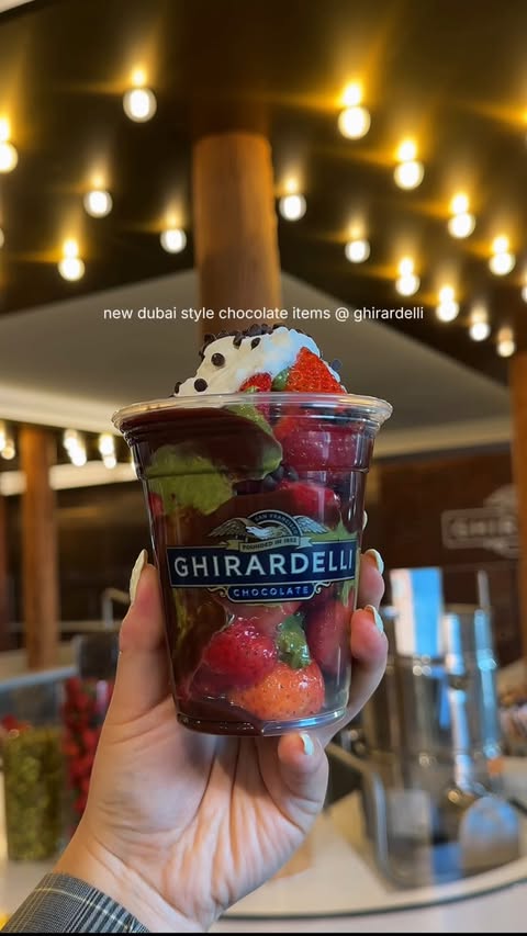Instagram post by @heatherr.eats for Ghirardelli Chocolate Company. Caption reads: 🍫NEW DUBAI STYLE CHOCOLATE ITEMS @ghirardelli 🍫....