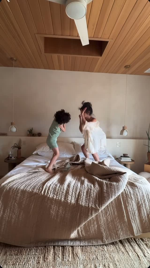 Instagram post by @newdarlings for Coyuchi. Caption reads: Chores with kids take longer, but they’re....