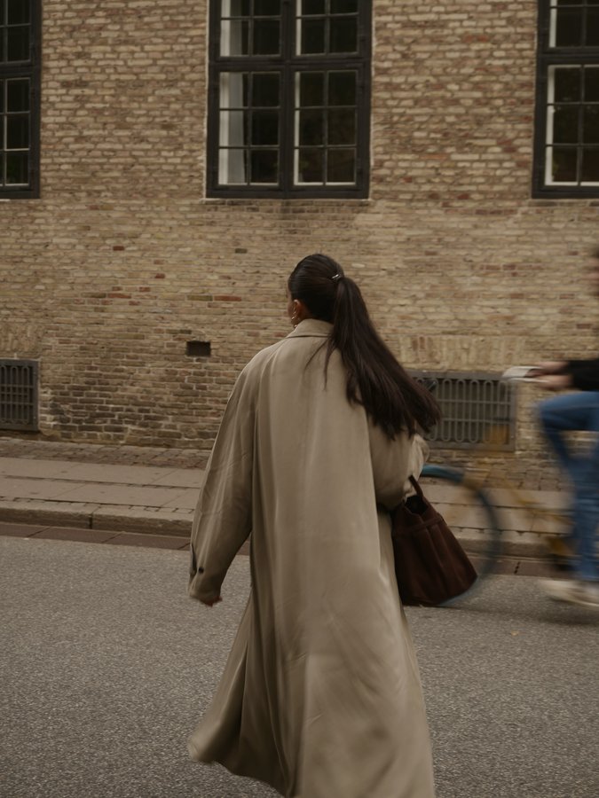 Instagram post by @selennergiz for Manu Atelier. Caption reads: cph day first🕵🏽‍♀️ #fyp #ootd #reklam.