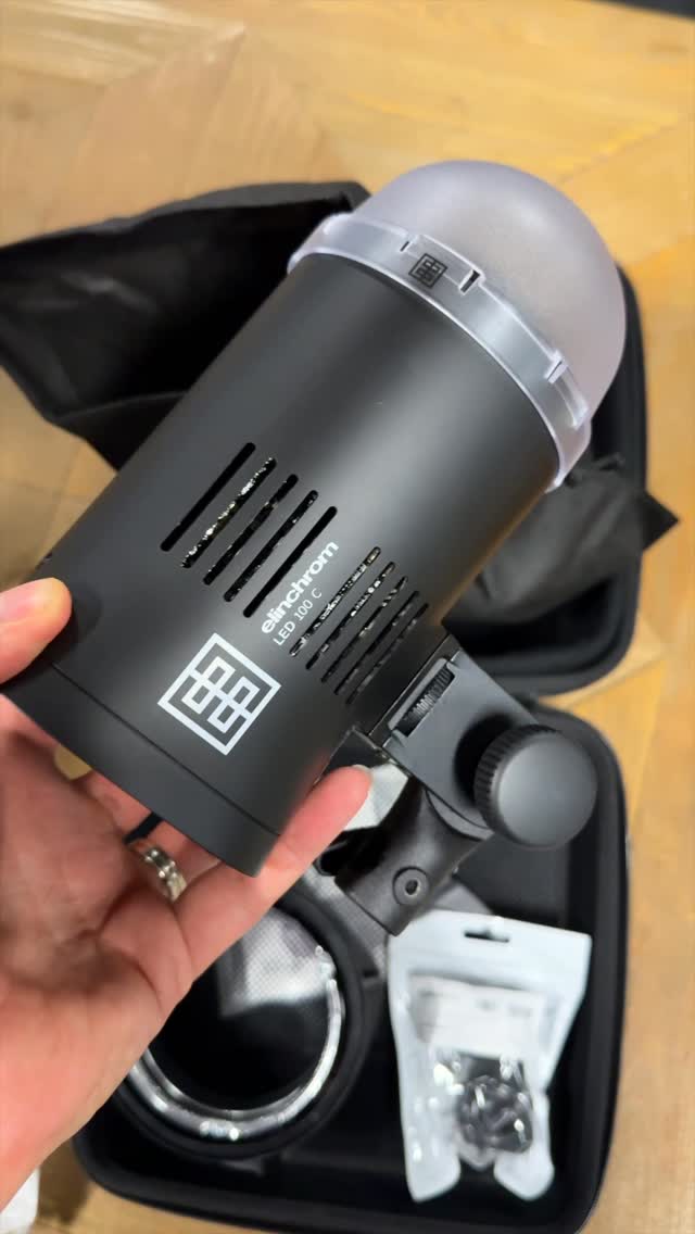 Instagram post by @johngressmedia for Elinchrom. Caption reads: Unboxing the brand new @elinchrom_ltd 100C LED!....
