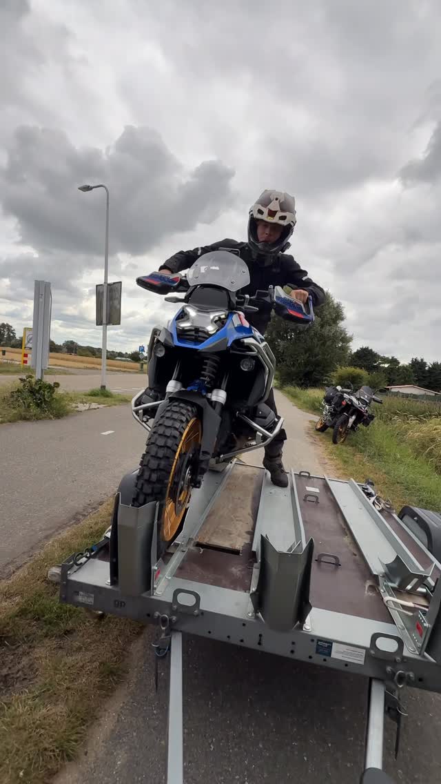 Instagram post by @remy_gsa_rally for XLMOTO. Caption reads: Loading the trailer with 2 fatties. Germany trip....