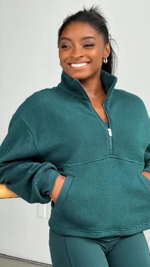 Instagram post by @simonebiles for Athleta. Caption reads: Studio to city in my @athleta fits, without....