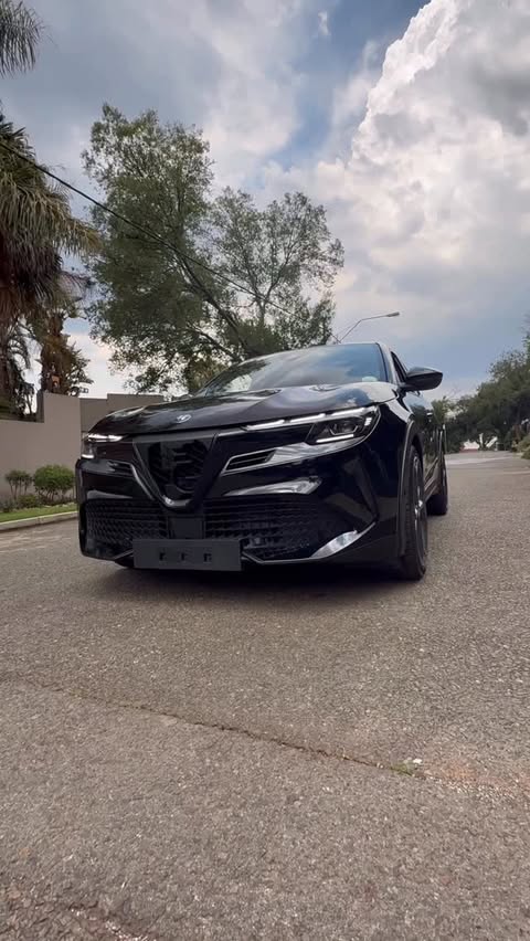 Instagram post by @young_prinzy for Alfa Romeo. Caption reads: Excited to hit the road with the new Alfa Romeo....