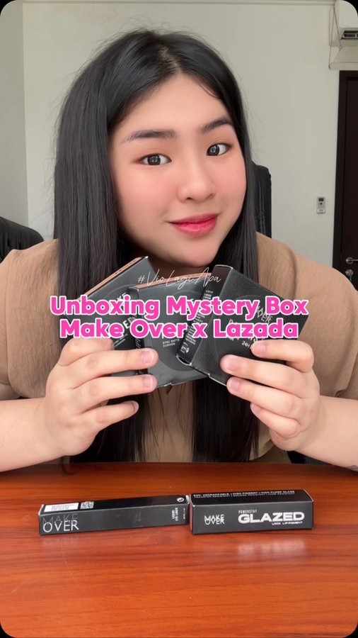Instagram post by @queenviolia for Lazada Indonesia. Caption reads: OKE POST KARNA ASIK JUGA TERNYATA MISTERY BOX MAKE....