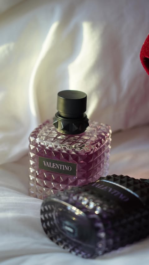 Instagram post by an influencer for Valentino Beauty. Caption reads: [...] Purple Melancholia by VALENTINO BEAUTY.....