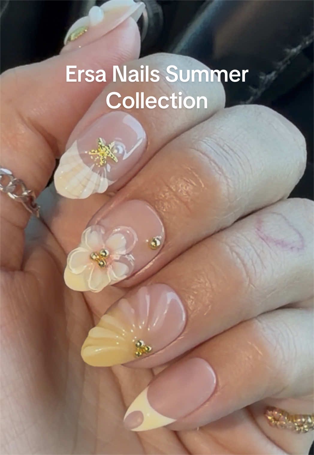 TikTok post by @marinasworlddd for Ersa Nails. Caption reads: @Ersa Nails #ersanails #summernails #ninapool....