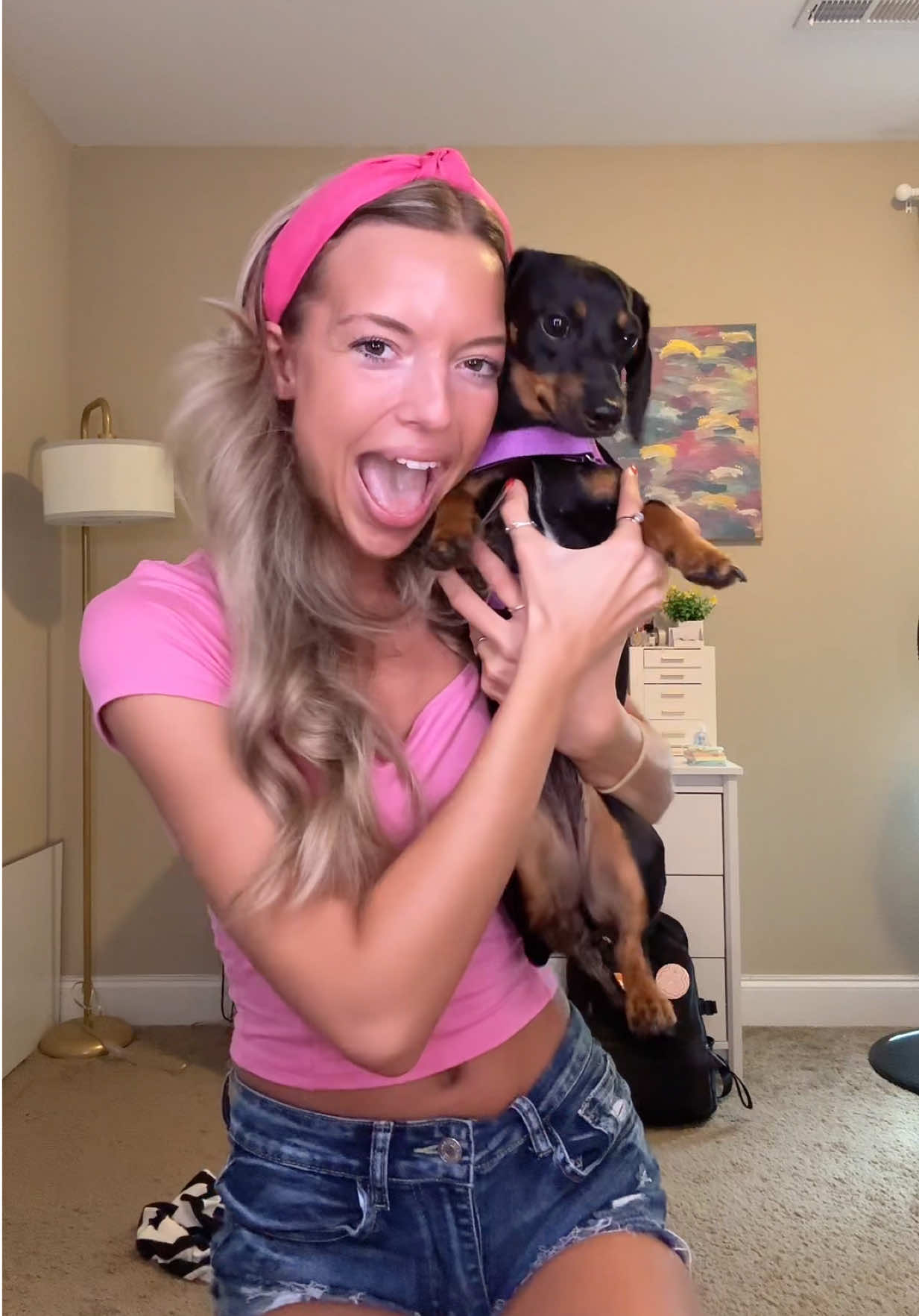 TikTok post by @baileyyh for Dog Friendly Co. Caption reads: GRWM (and my mini dachshund) for class at the....