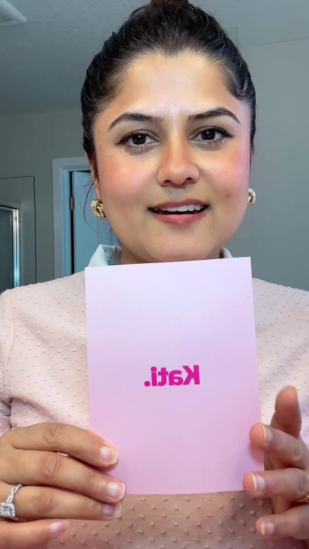 TikTok post by @sandhya_poudel87 for Kati Beauty NYC. Caption reads: [...] of makeup surprises for you all 😊. @Kati....
