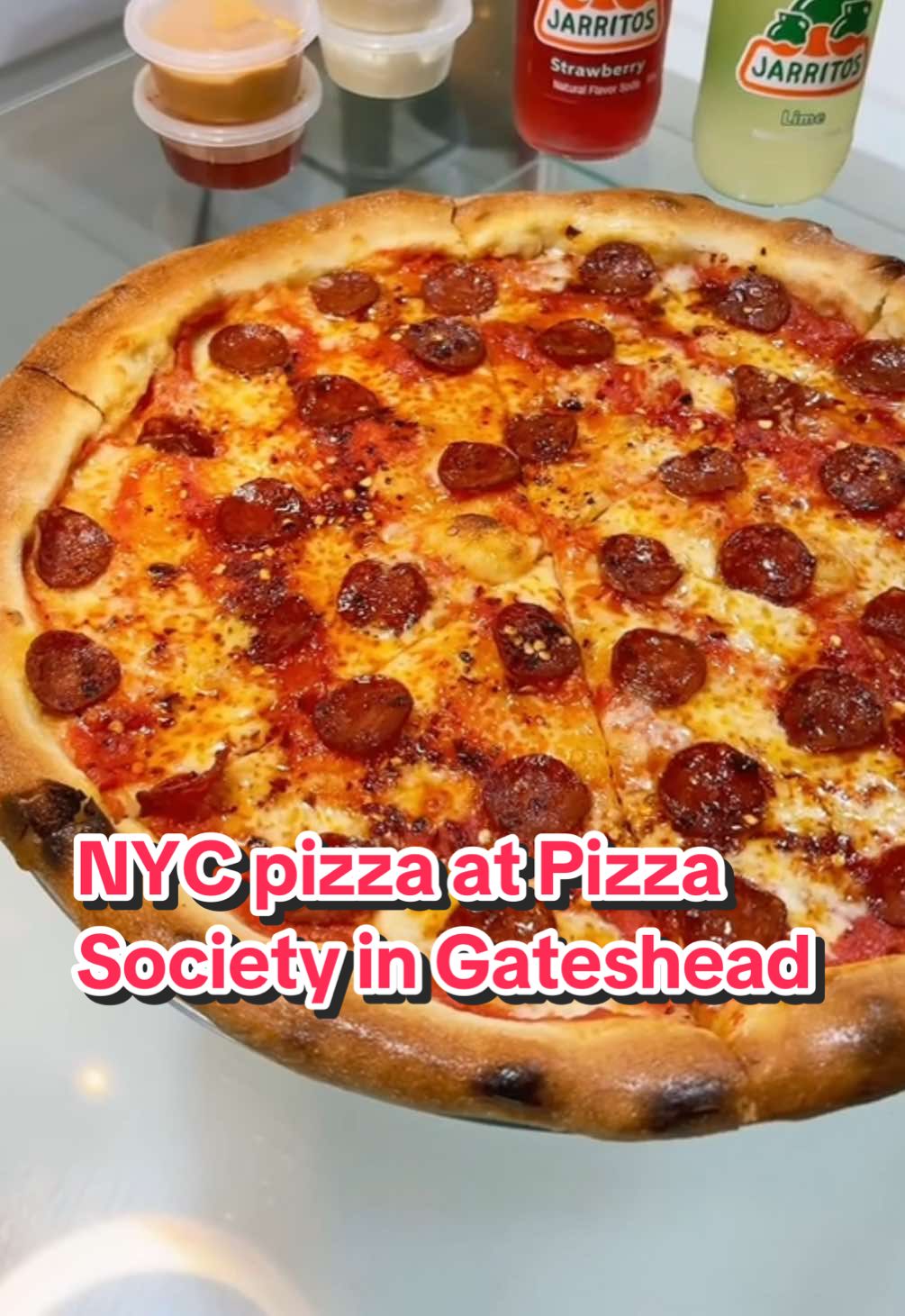 TikTok post by @eat.newcastle for Jarritos. Caption reads: 🆕 10/10 New York style pizza in Gateshead 🍕  AD....