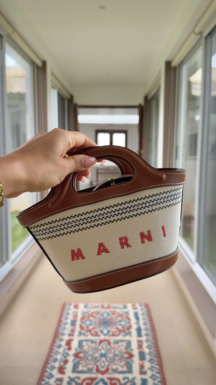 Instagram post by @swativatssa for Melissa. Caption reads: [...] - @dolcegabbana 
Bag - @marni 
Footwear -....