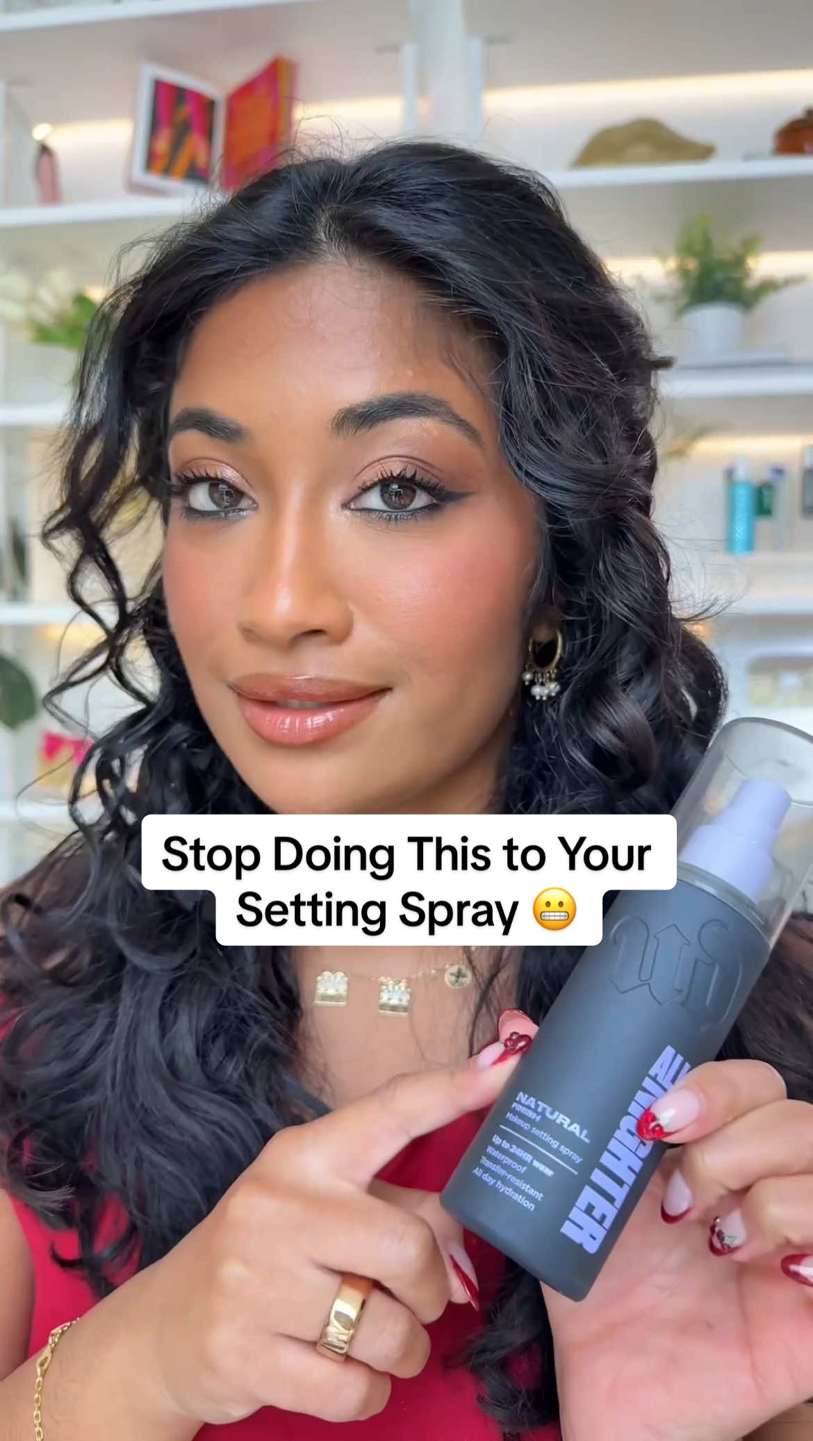TikTok post by @monica.raviii for Urban Decay. Caption reads: If you’re ONLY applying your setting spray at the....