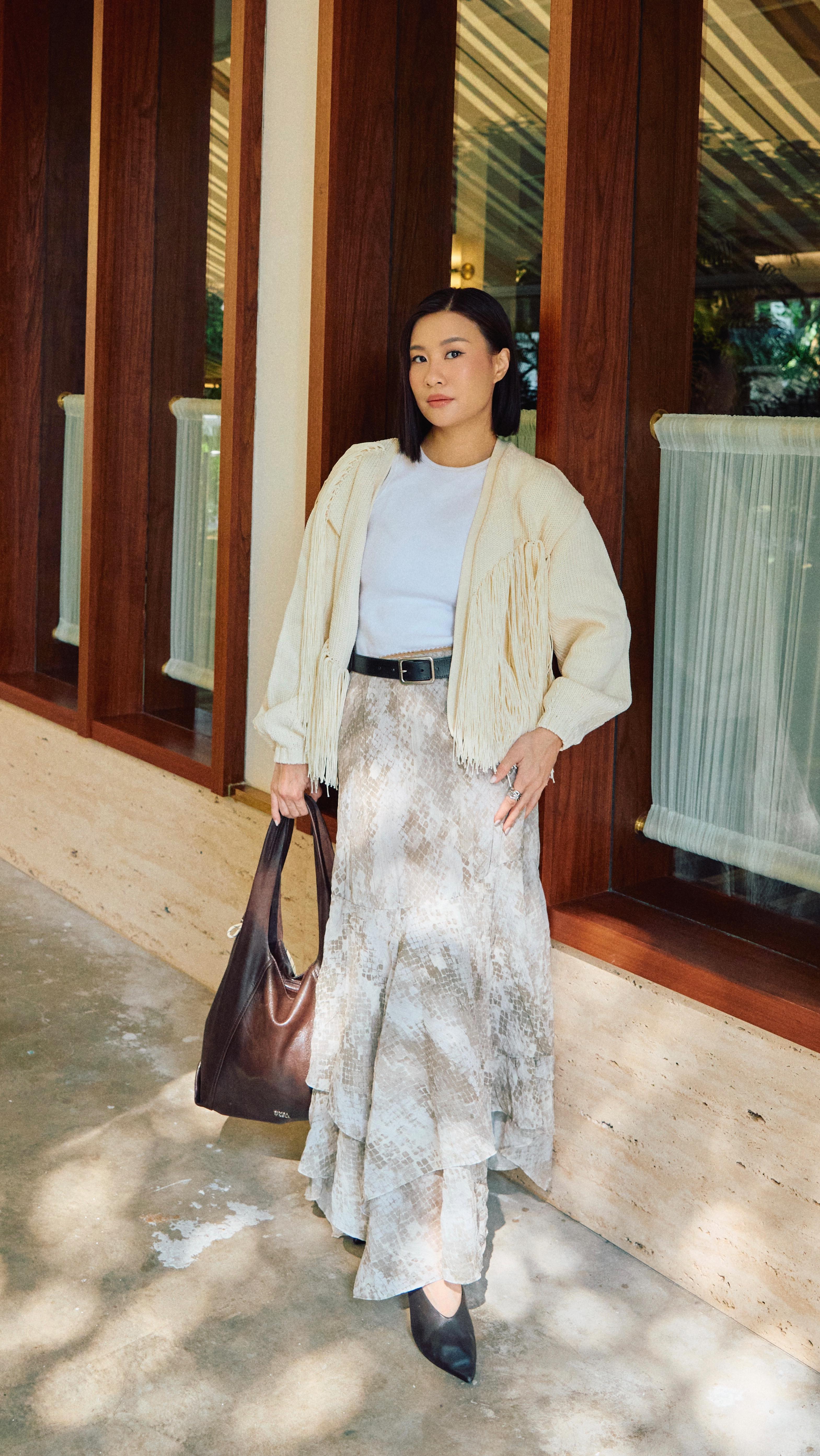 Instagram post by @salinachai for BIMBA Y LOLA. Caption reads: This is WHY this bag is going completely viral!!....