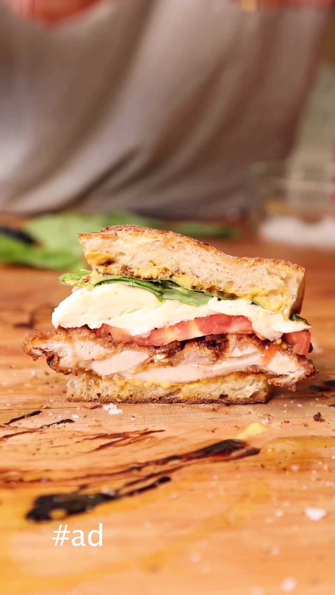 TikTok post by @salt_hank for Mark's Daily Apple. Caption reads: Caprese fried chicken sandwich with @Primal....