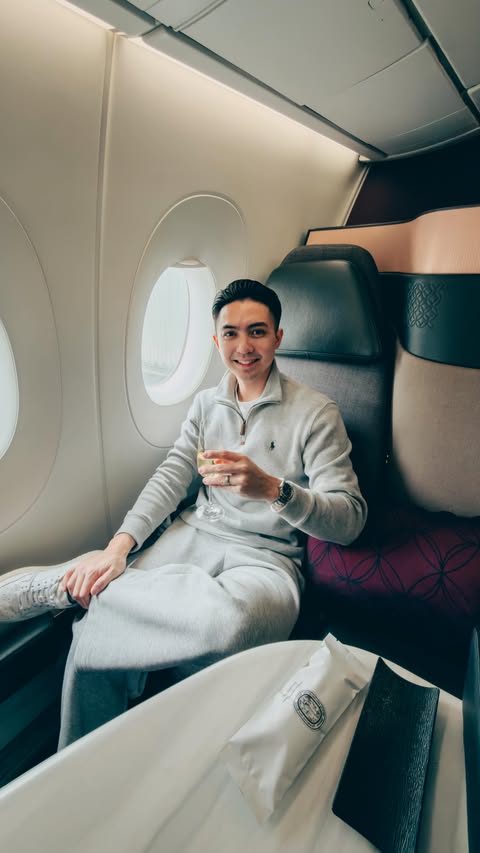 Instagram post by @renzsadiwa for Qatar Airways. Caption reads: My First Time Flying Qatar Airways Business Class....