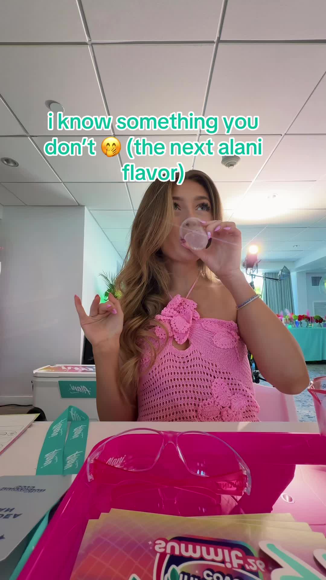 TikTok post by @makeitraeneee for Alani Nutrition. Caption reads: [...] drop your guesses 🤭 #alanipartner @Alani....