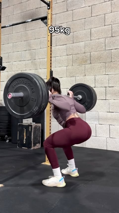 Instagram post by @yazmin.stevens for Gymshark. Caption reads: [...] BW back squat ✅✨ Wearing the new @gymshark....