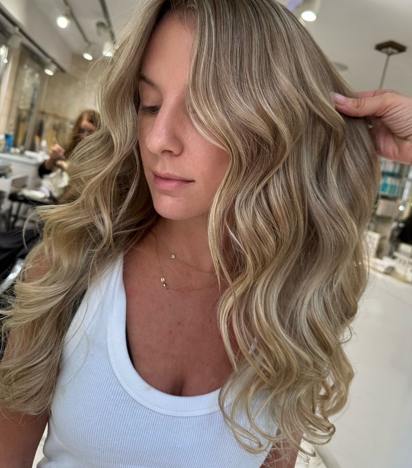 Instagram post by @lana_kurayeva for MODERN SALON. Caption reads: Gorgeous blonde AirTouch with mirror-like shine ✨....