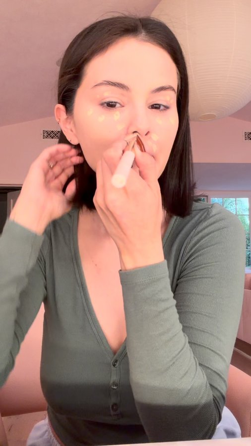 Instagram post by @selenagomez for Rare Beauty. Caption reads: just a nice evening at home with @rarebeauty 🏡 💕.