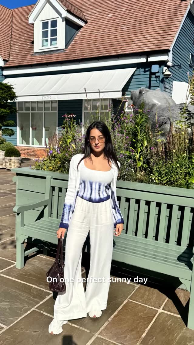 Instagram post by @tarinimanchanda for Bicester Village. Caption reads: My favourite thing about summer is shopping at....