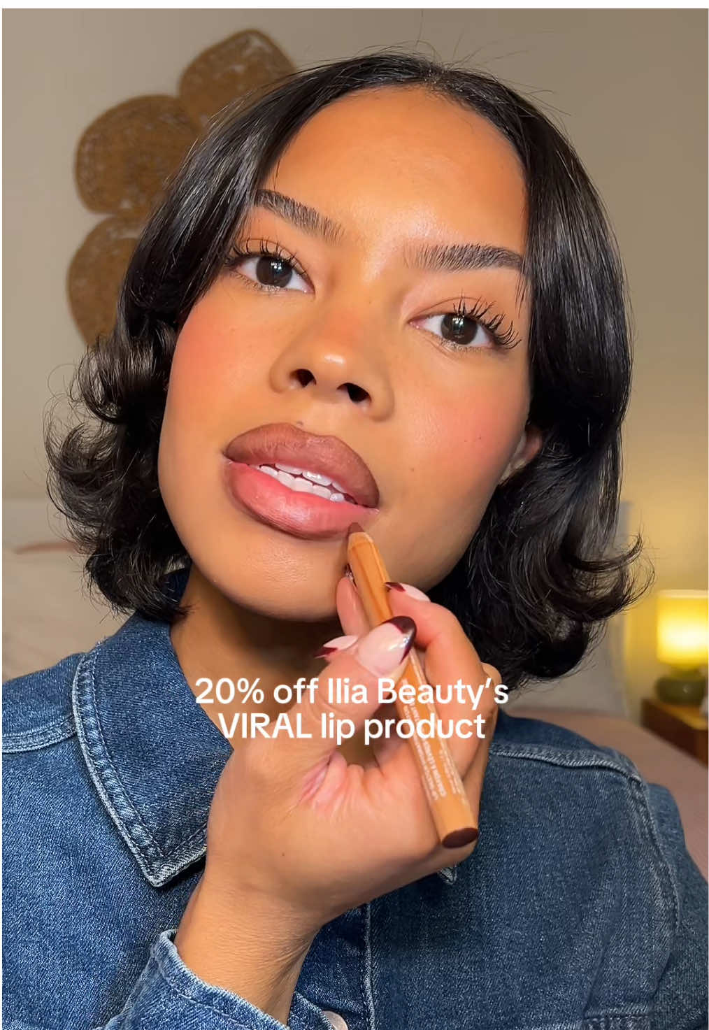 TikTok post by @juliannavlipscomb for ILIA Beauty. Caption reads: #AD Now’s your time to get 20% off your favorite....