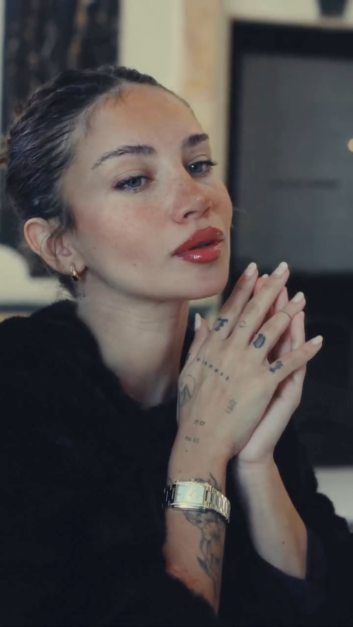 Instagram post by @lunaladenino__ for DKNY. Caption reads: [...] you, day to night, minute to moment🕰️🤍....