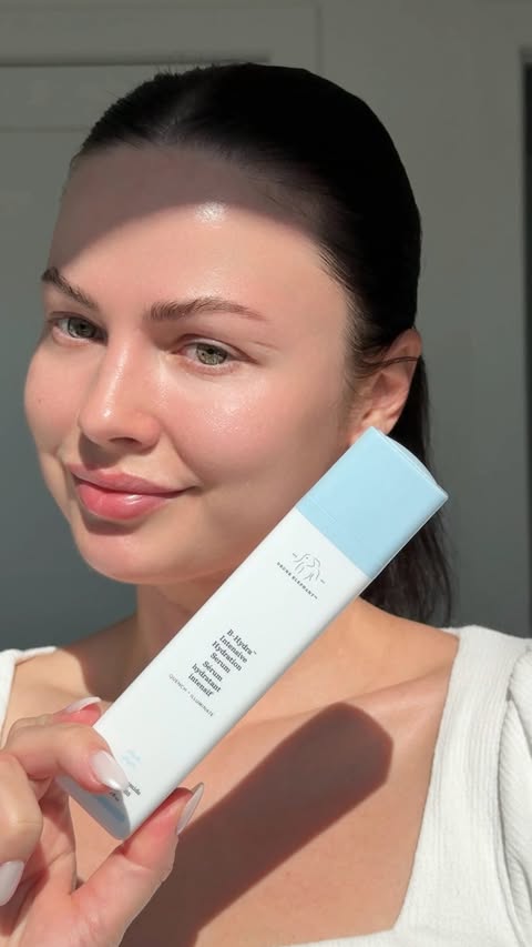 Instagram post by @tusyastrizh for Drunk Elephant. Caption reads: [...] Intensive Hydration Serum by Drunk Elephant....