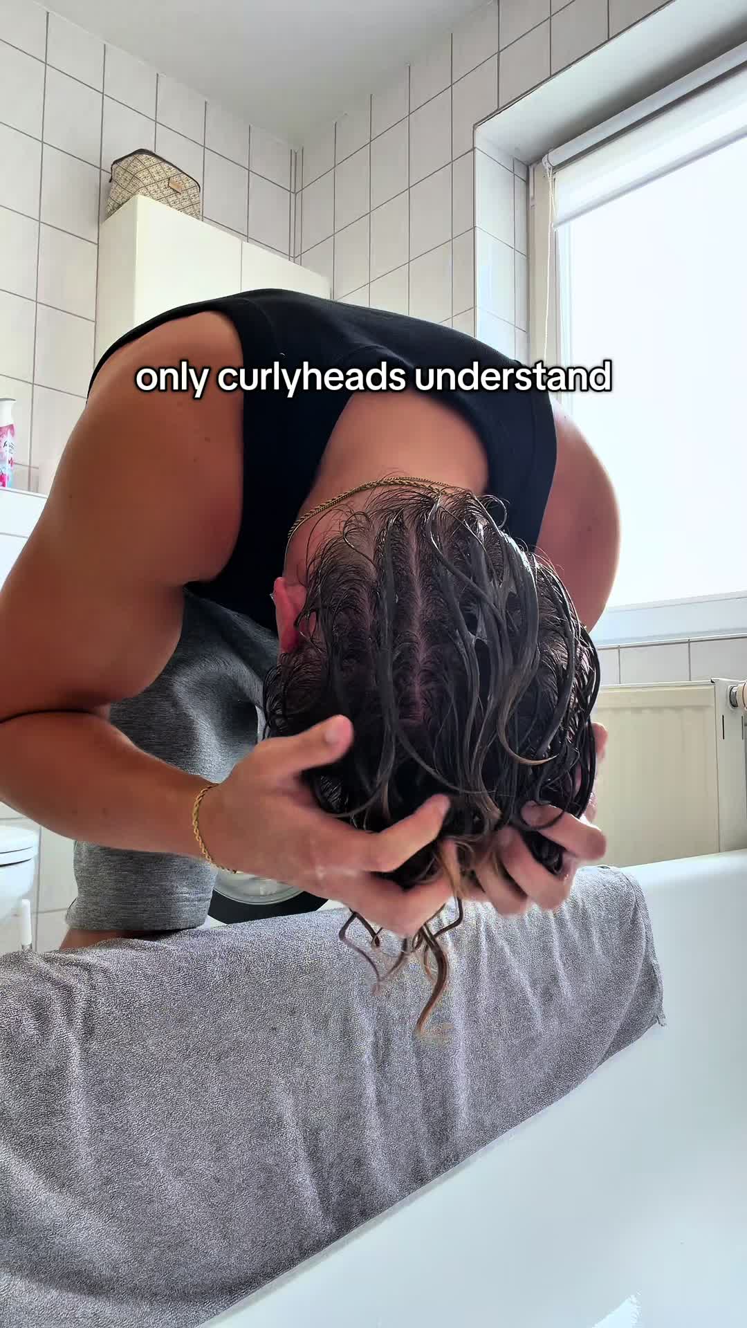TikTok post by @22waldemar for Based Bodyworks. Caption reads: only curlyheads understand | ad @BASED #hair....