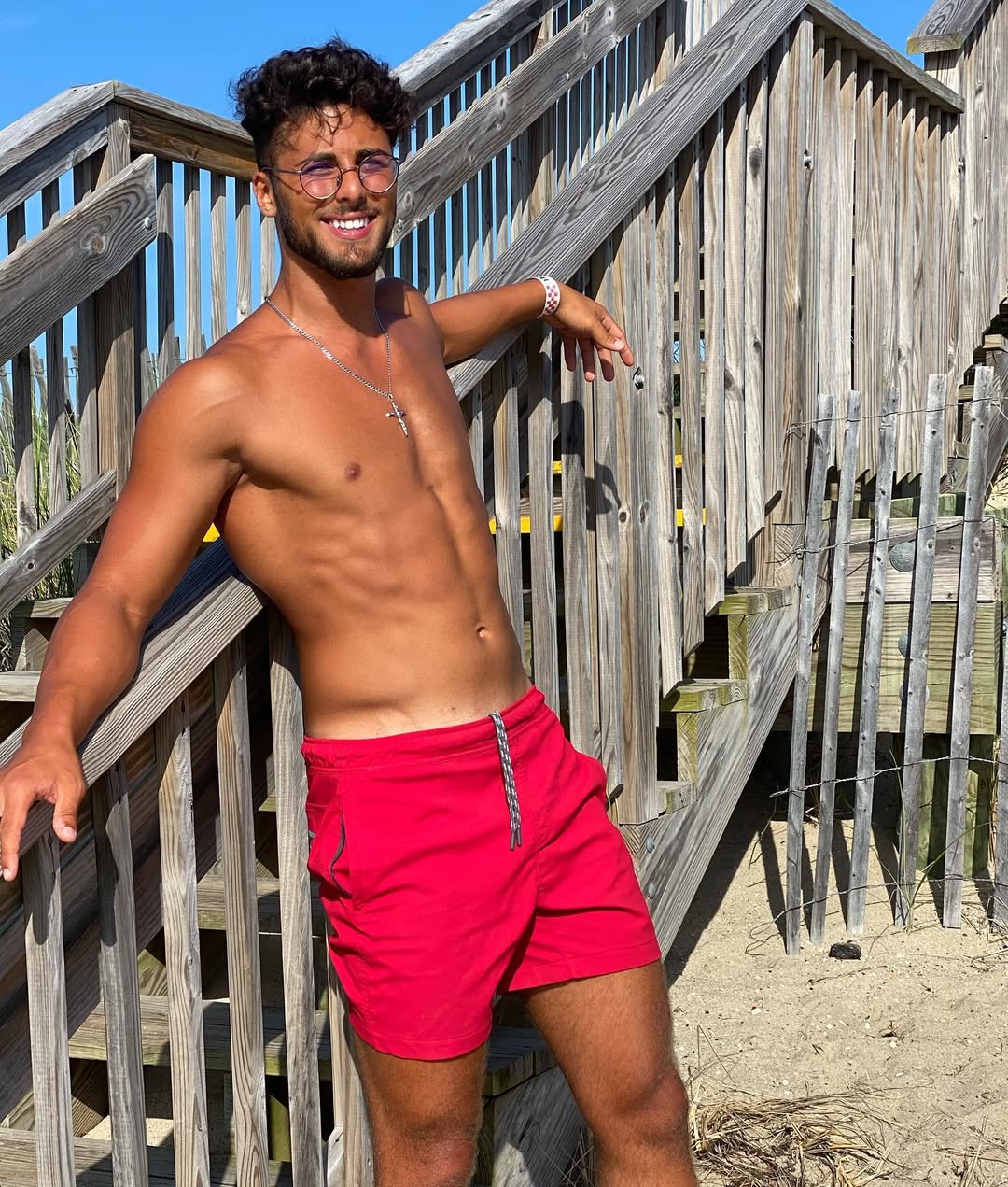Instagram post by @the.marellis for Mack Weldon. Caption reads: Ad: if you’re planning on going to the beach or....