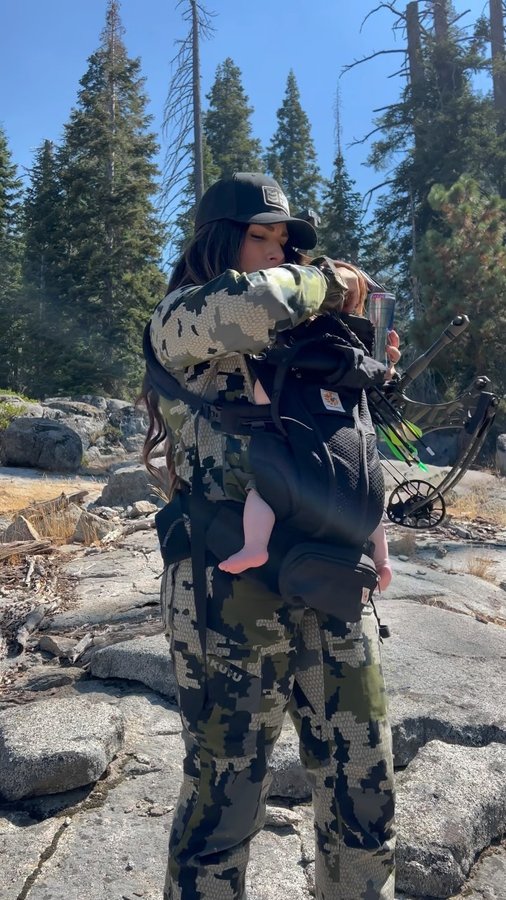 Instagram post by @thismsitaly for Kuiu. Caption reads: Take your kids everywhere #adventuresofpdawg....